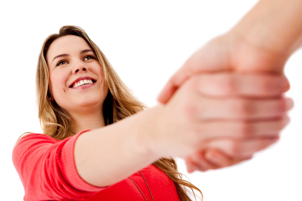 Female Remote Executive Assistant shaking hands